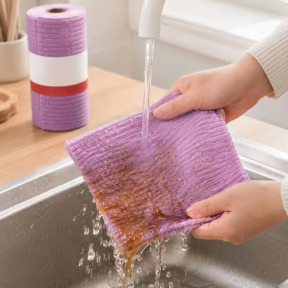Kitchen cleaning lazy rag throwing hands tearing wet and dry dishcloth absorbing water.